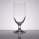 A Stolzle Nadine wine goblet on a reflective surface.