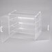 A clear plastic box with three compartments.