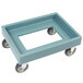 A slate blue plastic dolly with wheels for Cambro Camtainers and Camcarriers.