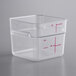 A square clear plastic Vigor food storage container with red writing.