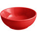 An Acopa Capri passion fruit red stoneware bowl.