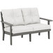 A POLYWOOD Lakeside white outdoor loveseat with gray cushions.