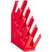 A red plastic slanted countertop organizer with four sections.