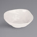 A white Cal-Mil melamine bowl with a small hole in the middle.