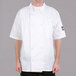 A man wearing a white Chef Revival short sleeve chef coat.