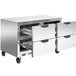 A stainless steel Beverage-Air undercounter with four drawers.