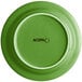 A green Acopa Capri stoneware plate.