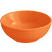 An Acopa Capri Valencia Orange stoneware bowl on a white background.
