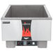 A Vollrath countertop rethermalizer with a lid on a stainless steel hot plate.