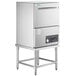 A stainless steel Noble Warewashing undercounter dishwasher with an open door.
