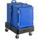 A blue CaterGator front loading food pan carrier on a black cart.