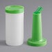 A white container with a green cylindrical pour spout and green cap.