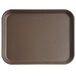 A brown rectangular Cambro non-skid serving tray with a logo on it.