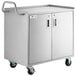 A silver Regency stainless steel utility cart with wheels and two locking doors.