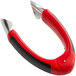 An OXO Good Grips stainless steel curved tool with a red and black handle.