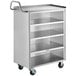 A silver Regency stainless steel utility cart with four shelves on wheels.