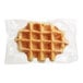 An individually wrapped White Toque Liege waffle in a plastic bag.