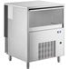 A silver stainless steel Manitowoc undercounter nugget ice machine with a window.