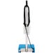 A blue and white Namco Floorwash 5000 walk behind cylindrical floor scrubber with a cord and handle.