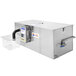 A large metal Grease Guardian GGX50 automatic grease trap with a clear container inside.
