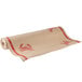 A roll of white paper with red crab designs.