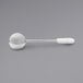 An OXO stainless steel wand with a white round handle.