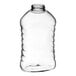 A clear ribbed plastic hourglass honey bottle with a white lid.