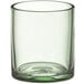 A clear glass with a green rim.