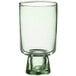 An Acopa Pangea green glass goblet with a white background.