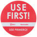 A roll of 500 white round labels with a red circle and white text that says "Use First"