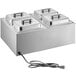 A silver ServIt countertop food warmer with 4 rectangular pans and 4 lids.