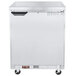 A silver Beverage-Air worktop freezer with a flat top and a handle on wheels.