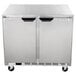 A silver Beverage-Air undercounter refrigerator with two doors and wheels.