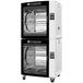 A large white and black electric Rotisol-France Roti-Roaster rotisserie oven with 16 baskets.