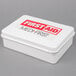 A white Medique first aid box with red and black text.