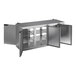 A stainless steel Beverage-Air back bar cooler with open doors.