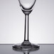 A clear Libbey Napa Country flute glass of wine on a table.