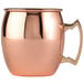 An Arcoroc copper mug with handle.