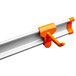 Toolflex orange tool hooks on a metal bar.