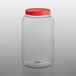 A clear plastic jar with a red lid.