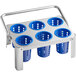 A metal tray with 6 blue plastic perforated cups on it.
