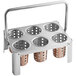A stainless steel flatware carrier with 6 copper perforated cylinders in it.