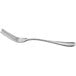 An Acopa Inspira stainless steel table fork with a curved design on the handle.