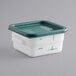 A white Vigor food storage container with a green lid.
