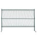 A Metroseal wire rack with slanted shelves and a green fence.