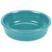 A turquoise Fiesta china bowl with a white interior.