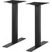 A pair of black metal BFM Seating Uptown square column table bases.