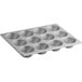 A silver Baker's Mark muffin pan with 12 cups.