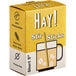 A yellow and white box of HAY! wheat stir sticks with a picture of a drink and straw.