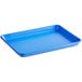 A light blue Baker's Mark aluminum sheet tray with a wire rim.